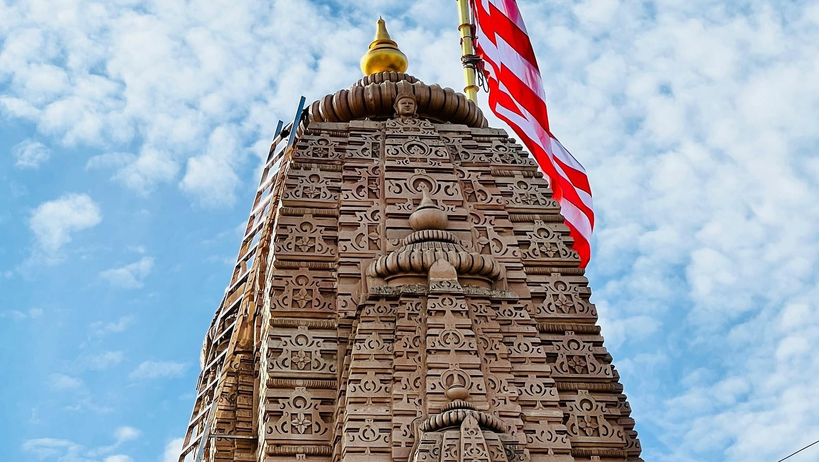 A temple top with a flag fixed at the top.