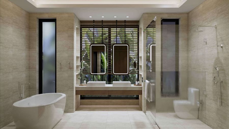 A bathroom at Ramada Resort by Wyndham Khao Lak, with a freestanding bathtub, double sinks, and a walk-in shower.