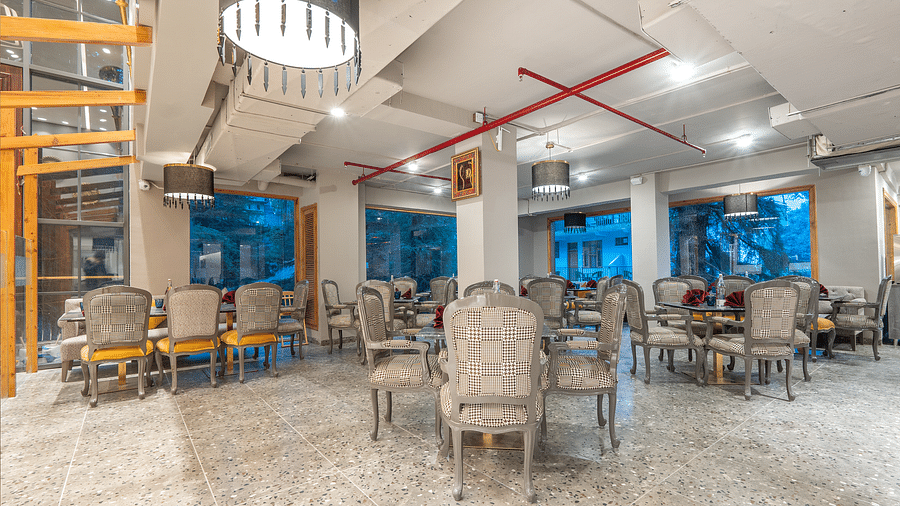 an image of a dining space with marble flooring