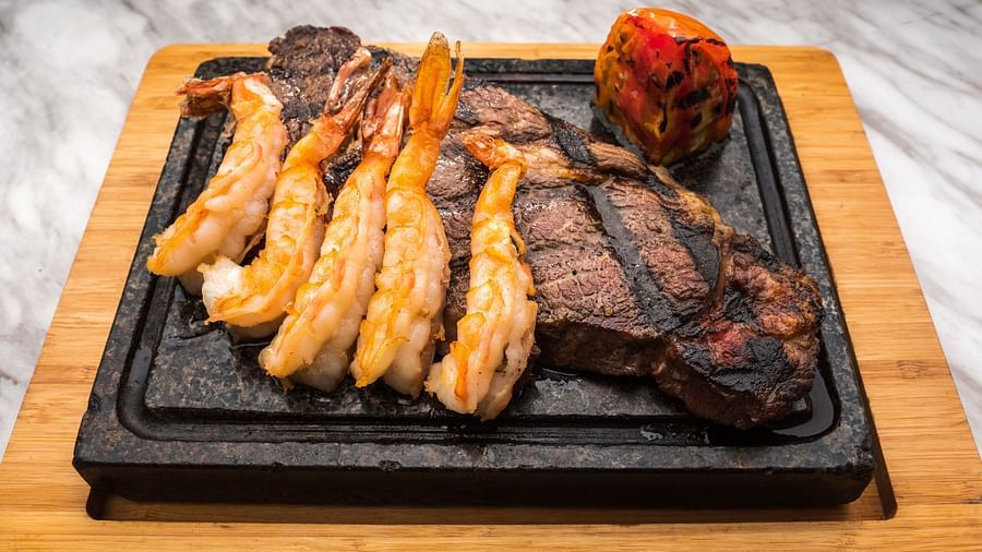 An image of a dish made of shrimp and steak served at our restaurant - S Hotel Montego Bay, Jamaica