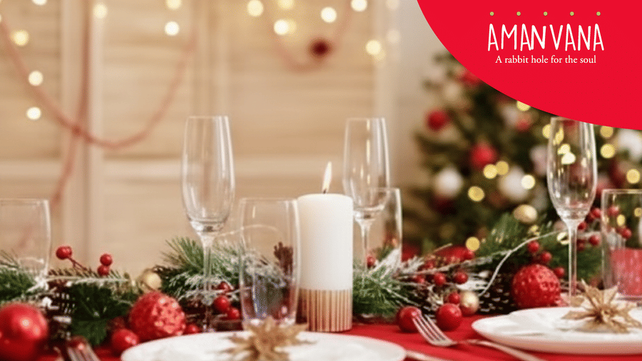 Creative at Amanvana Spa Resort – A Luxury Resort in Coorg showcasing a special Christmas lunch offer with festive table setting and 15% off promotion.