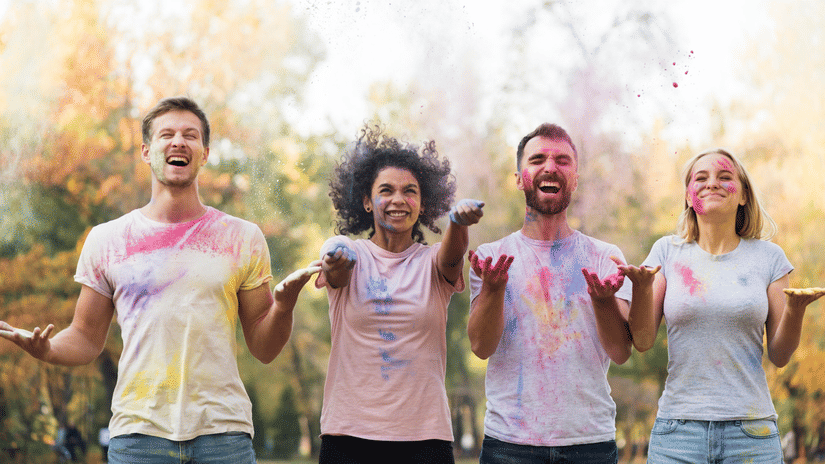 group playing holi