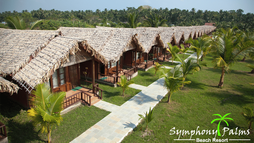 Cottages with thatched roof at Symphony Palms Beach Resort And Spa, one of the finest 5-star luxury resorts in Havelock Island.