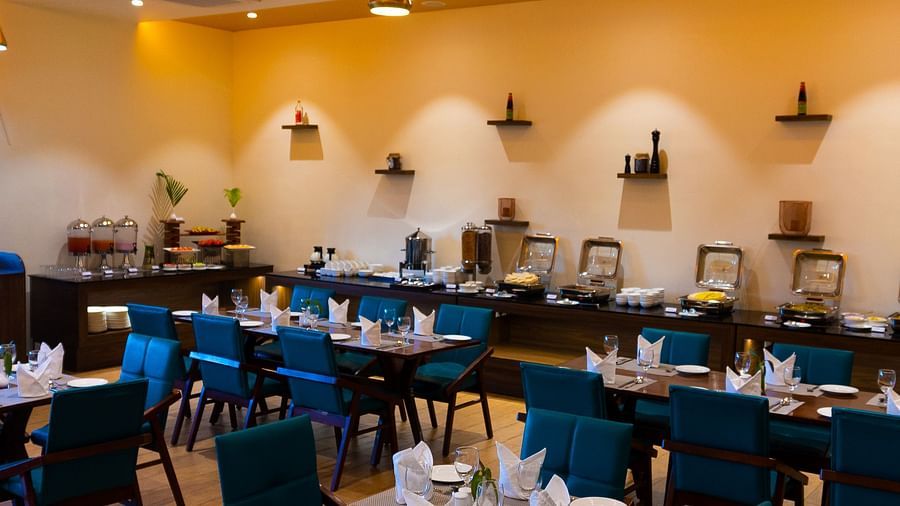 well lit sitting area in restaurant at Jagira Ananta Elite 2
