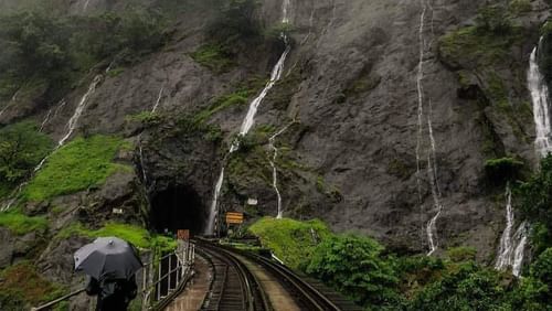 a waterfall cascading down a hill 4