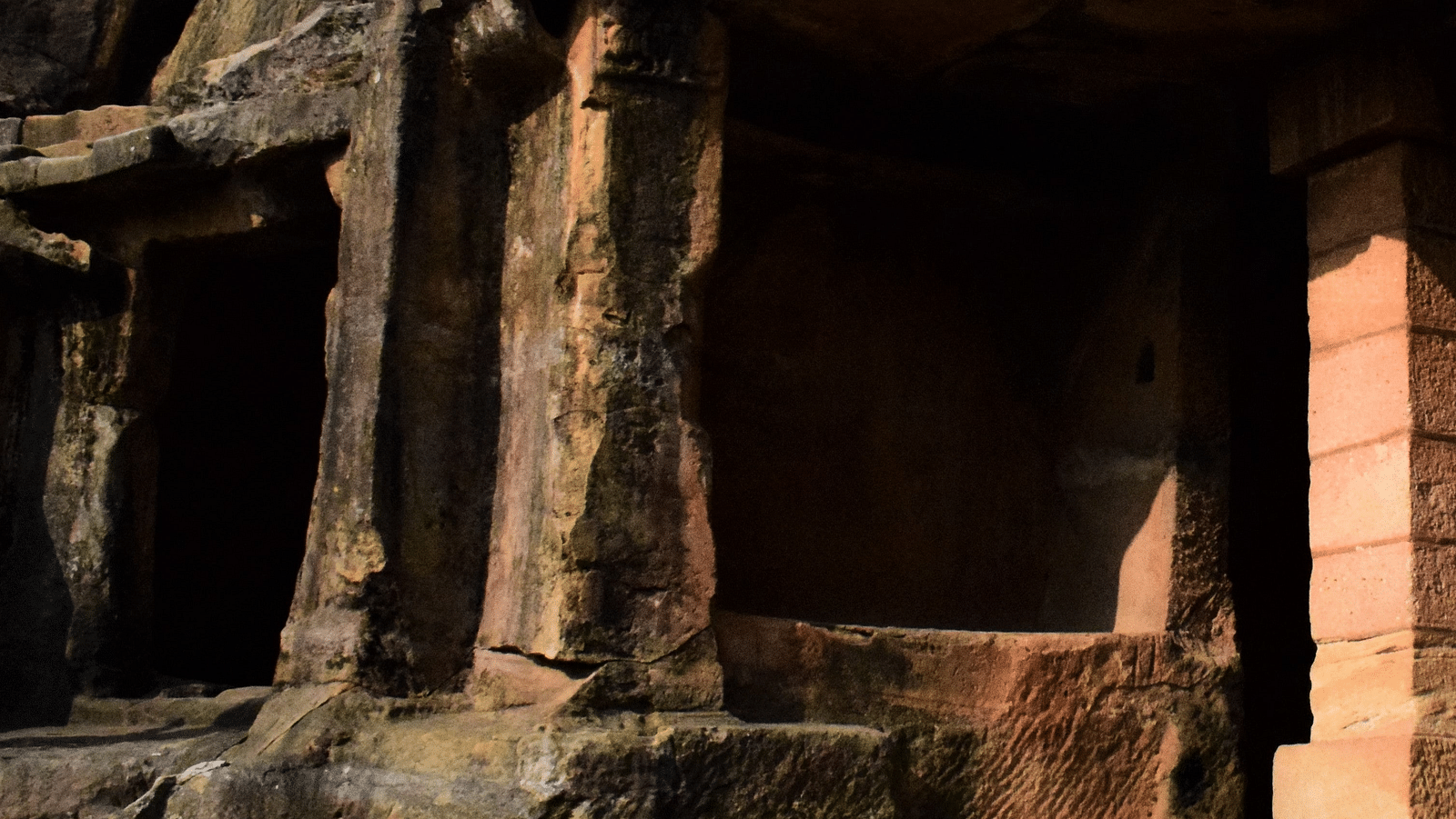an image of a person sitting in a historic place