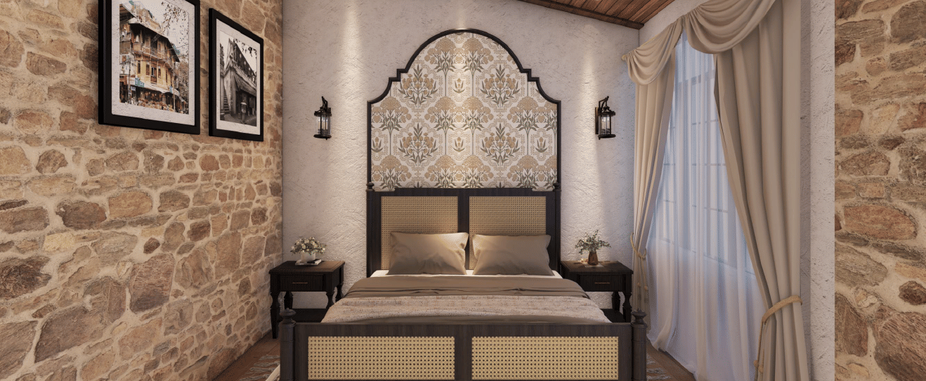 Bedroom with a stone feature wall, vaulted ceiling, and a decorative, arched wrought-iron headboard at BluSalzz Terrah Hills Resort, Dalhousie.