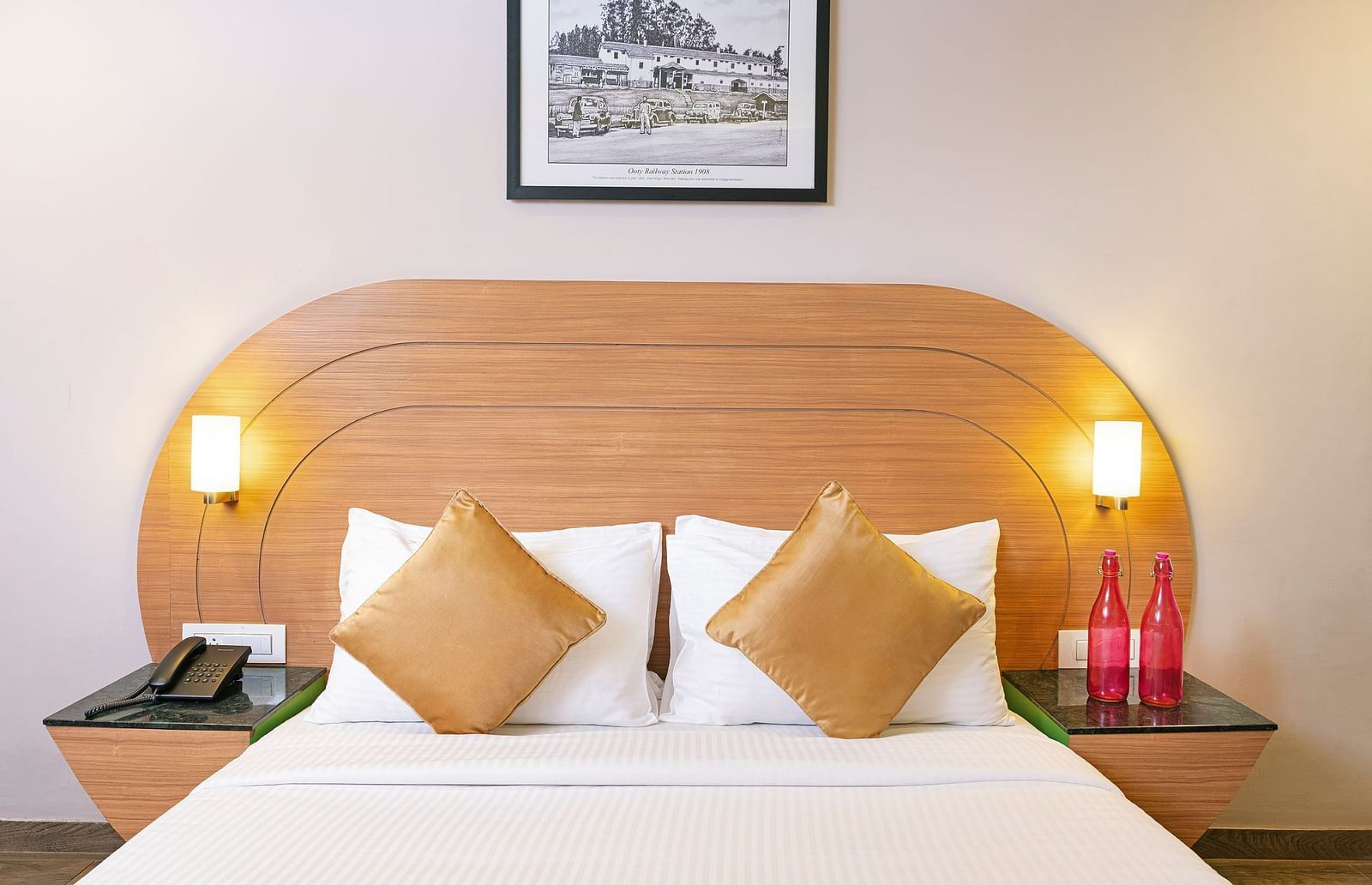 An image of a double sized bed | Mango HIll Central, Ooty