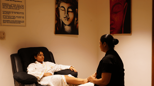 A woman enjoying foot spa at Saatviki Spa at Pride Plaza Hotel in Kolkata
