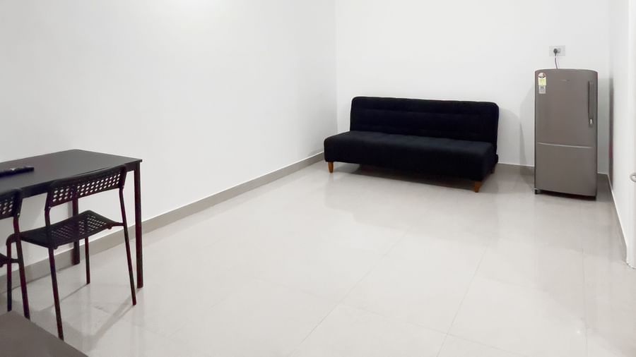 Living space with sofa, dining table, and tiled flooring at The Pinnacle, Electronic City.