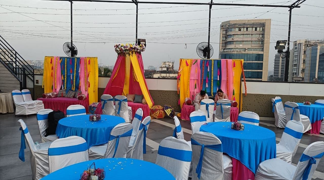 Image of a terrace with tables and chairs for an event at The Oriental Residency