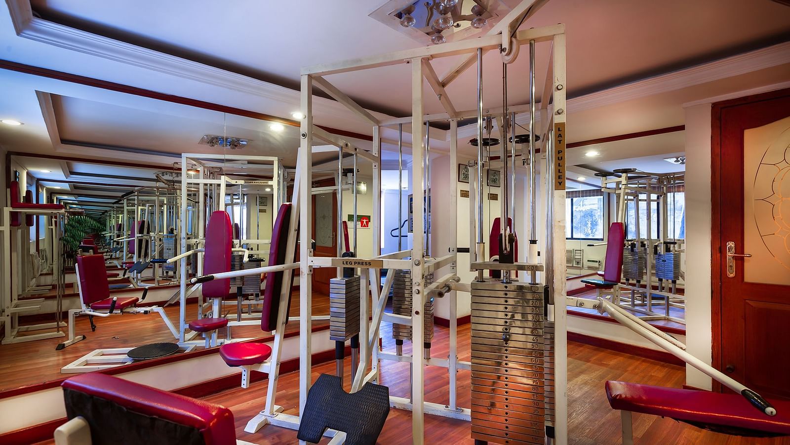 An image of a gym with equipment at Regency Madurai by GRT Hotels 
