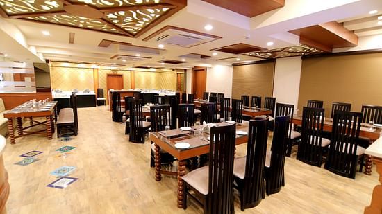 The seating arrangement at the Restaurant 3 - Udman Hotel Haridwar