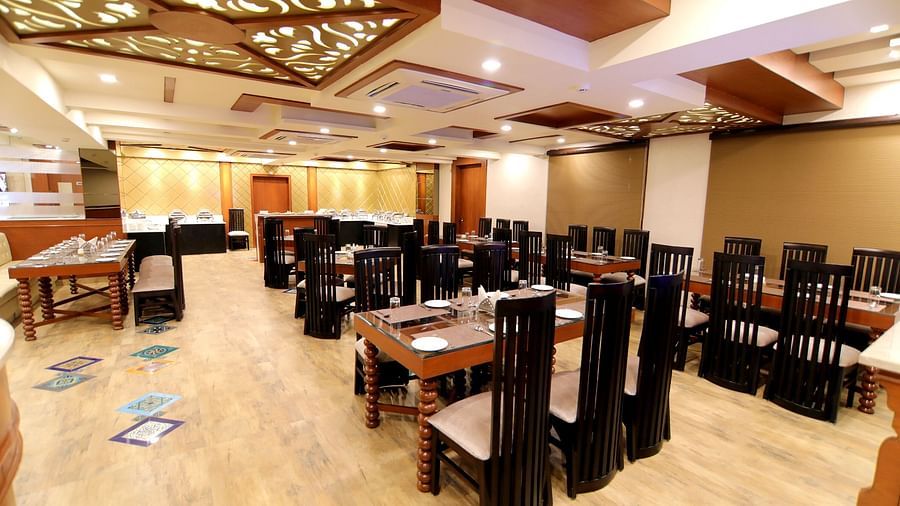The seating arrangement at the Restaurant 3 - Udman Hotel Haridwar