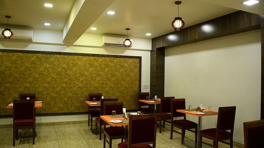 Restaurant-style dining space with ceiling lights