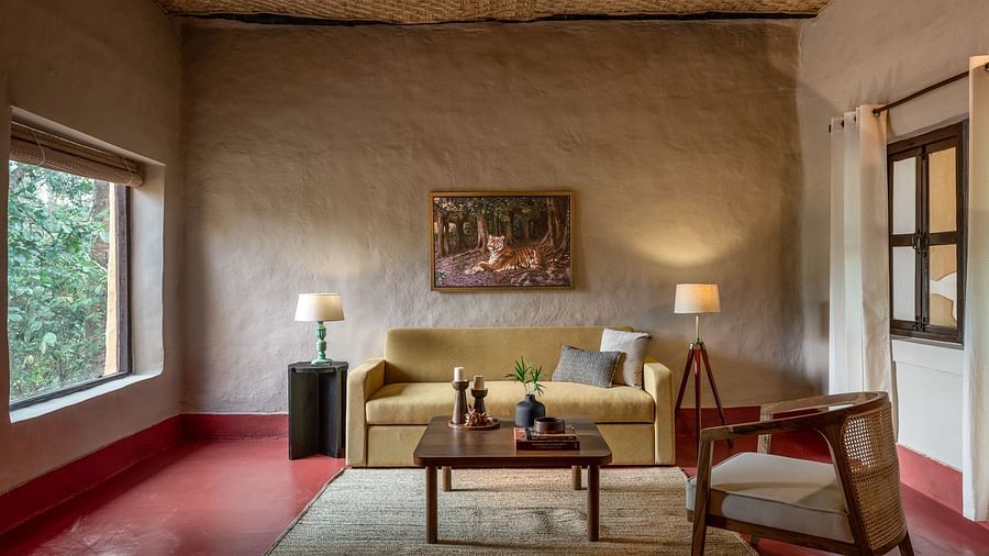 Front view of the sofa in Mud House Suite at Saccharum Safari Lodge, Balaghat