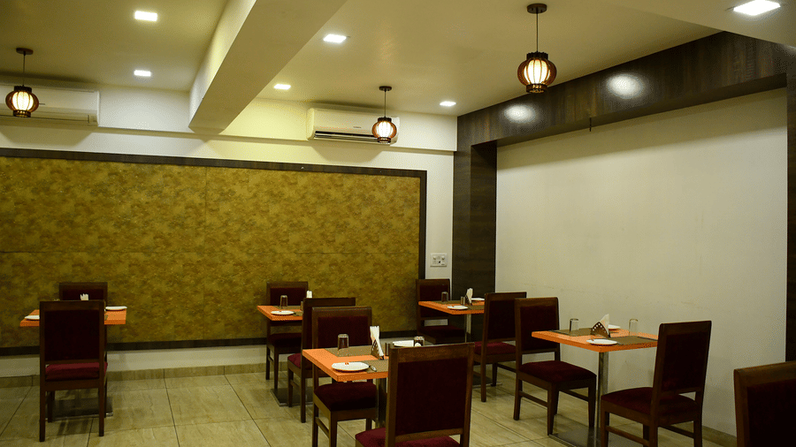 Restaurant-style dining space with ceiling lights