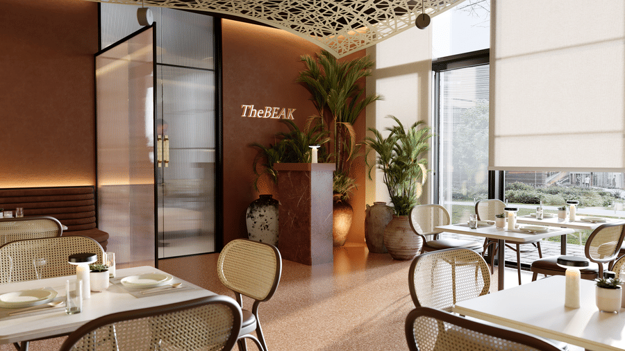 The Beak Bistro, one of the best places to eat in Accra at The Pelican Hotel feauting tabls and chairs arranged against a large ceiling-to-floor window