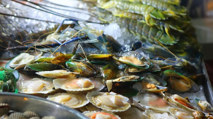 a local market selling a wide variety of sea food items 