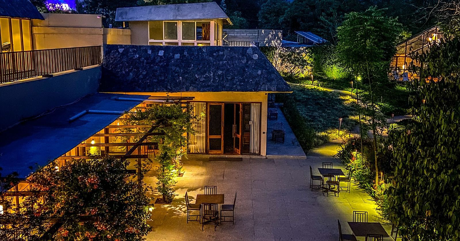 Sub-aerial view of Saraca Resort & Spa Corbett at blue hour