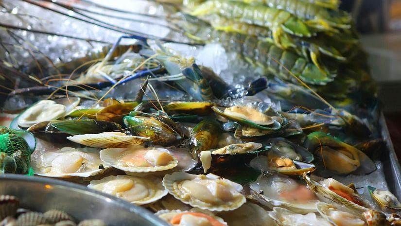 a local market selling a wide variety of sea food items 