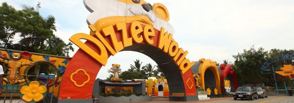 Entrance of MGM Dizzee World in Chennai under partially clouded sky