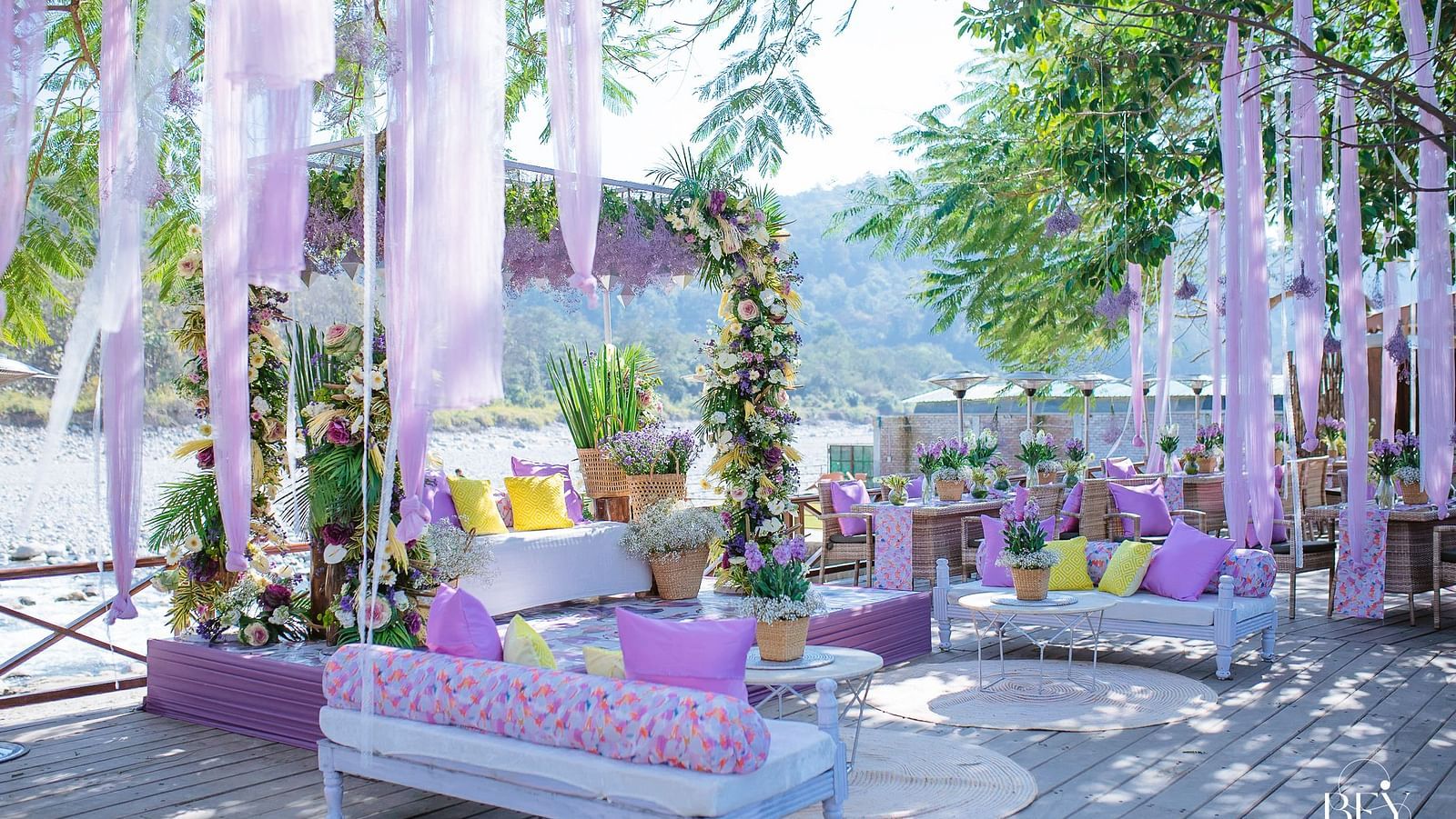An image of an outdoor seating arrangement decorated with flowers