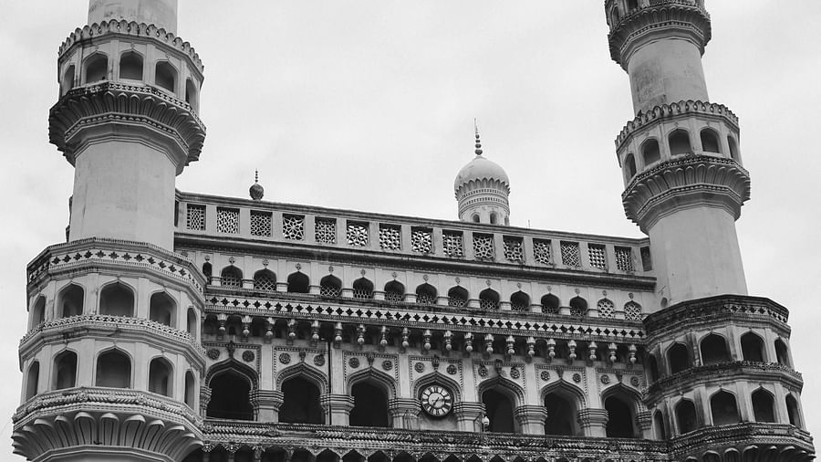 an image of charminar with a clear sky background