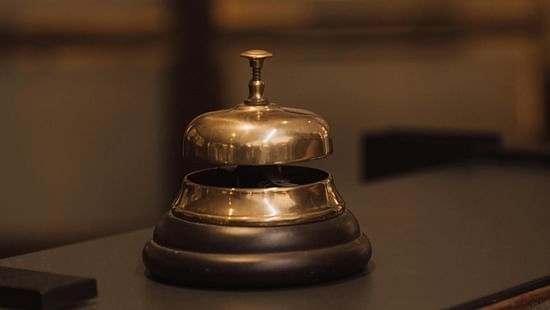 an image of concierge bell on the table