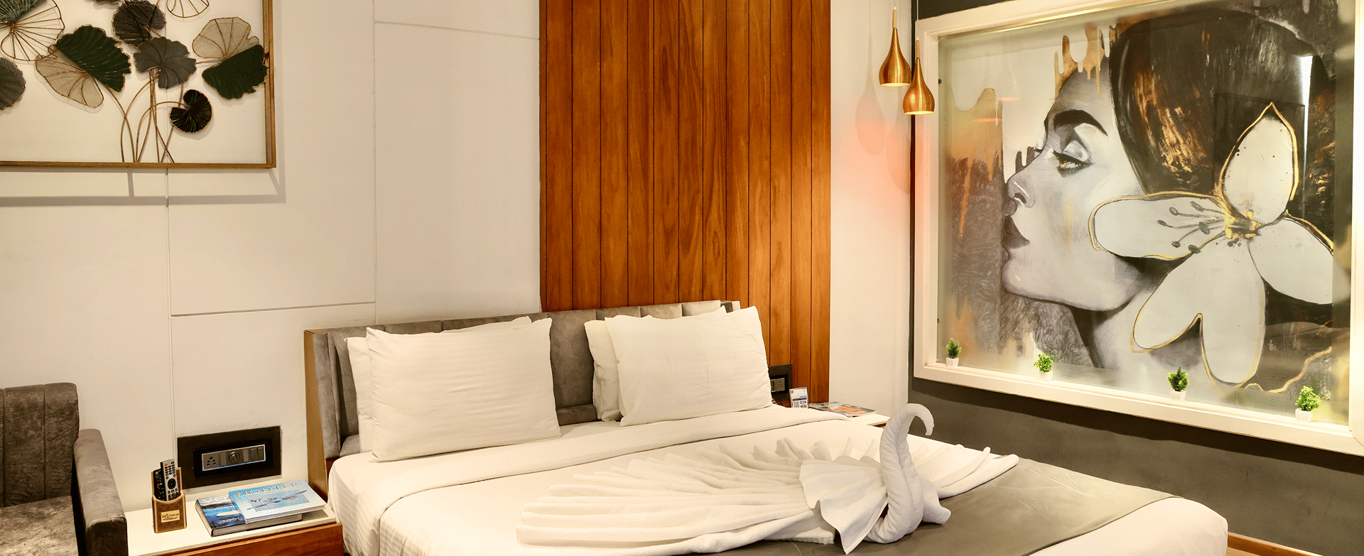 Accommodations, Bed against the wood-panelled wall