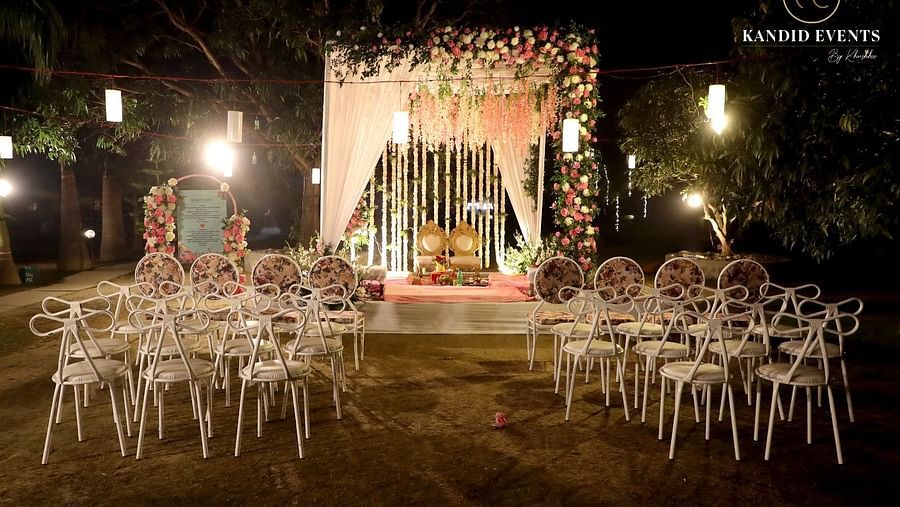 Intimate outdoor wedding mandap with floral decor and elegant seating at Tattwa Corbett Resort.