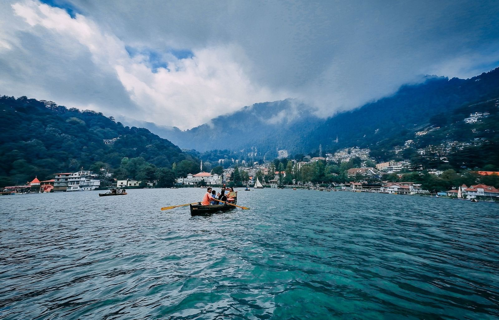 A wide view of a boating in Naini lake during the day