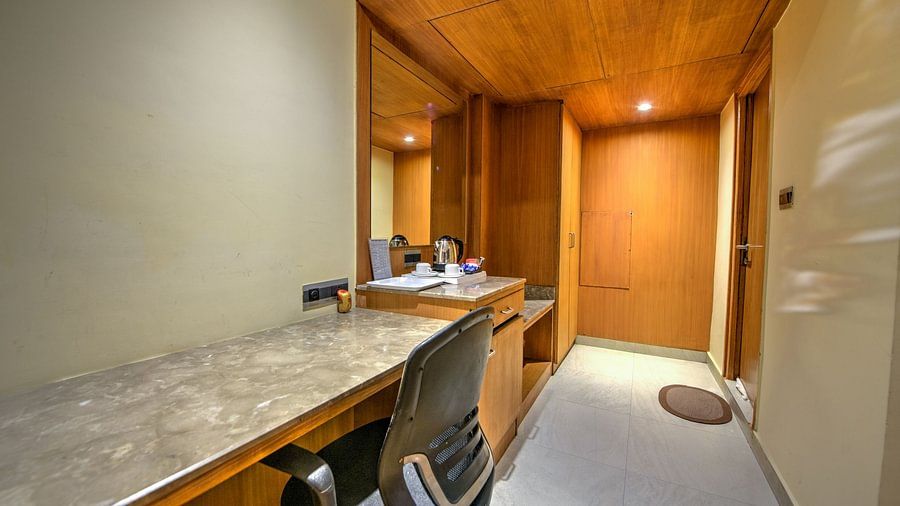 room with a work desk and chair