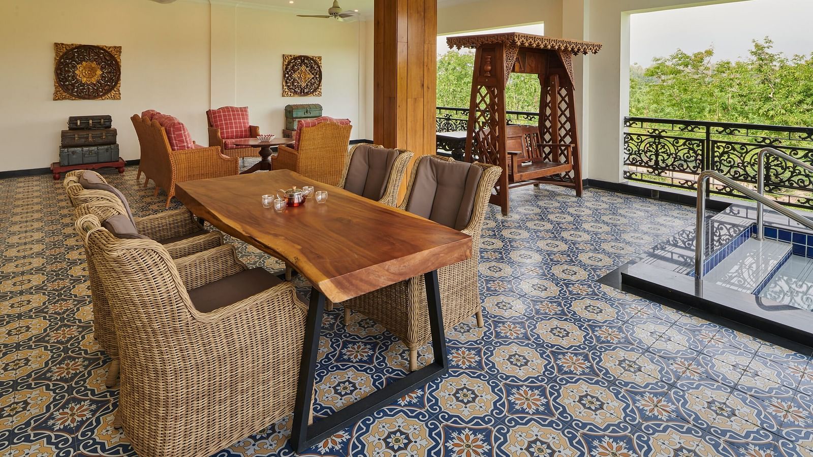 Spacious balcony seating area with scenic views at MAYFAIR Tea Resort, Siliguri
