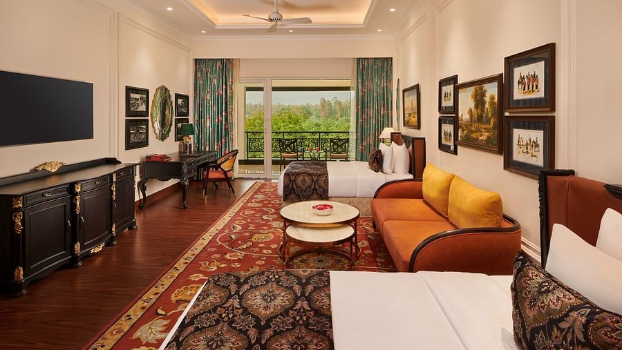 Modern bedroom with stylish furniture and access to a private garden.