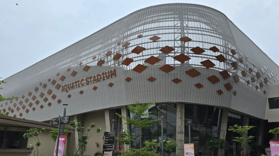 Modern Naranpura Sports Complex exterior, a large, contemporary stadium and athletic facility in Ahmedabad.