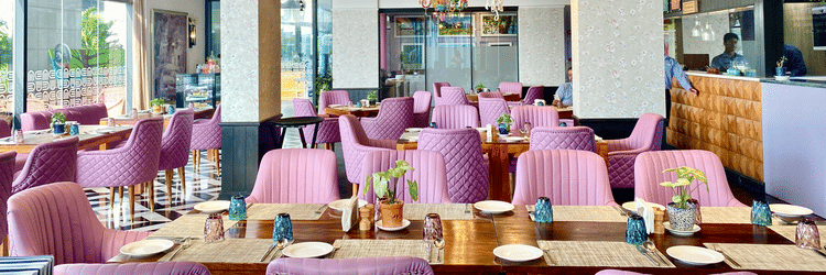 Seating arrangements inside a restaurant - Karma Lakelands.