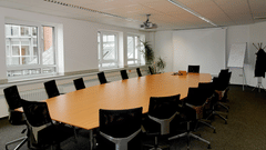 chairs around a table in a conference room