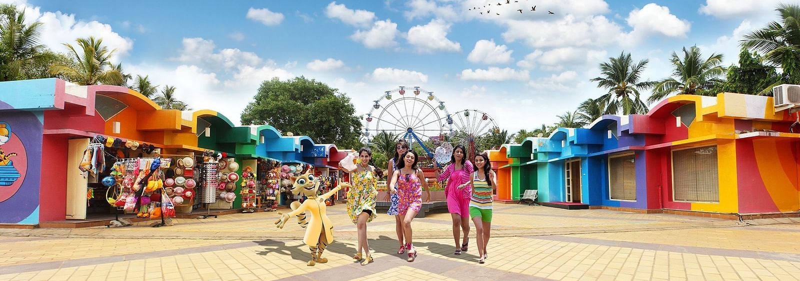 a group of people walking around MGM Dizzee World