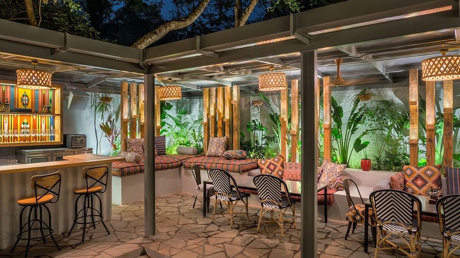 Seating arrangements of cotton mattresses with a table in front at Village 36
