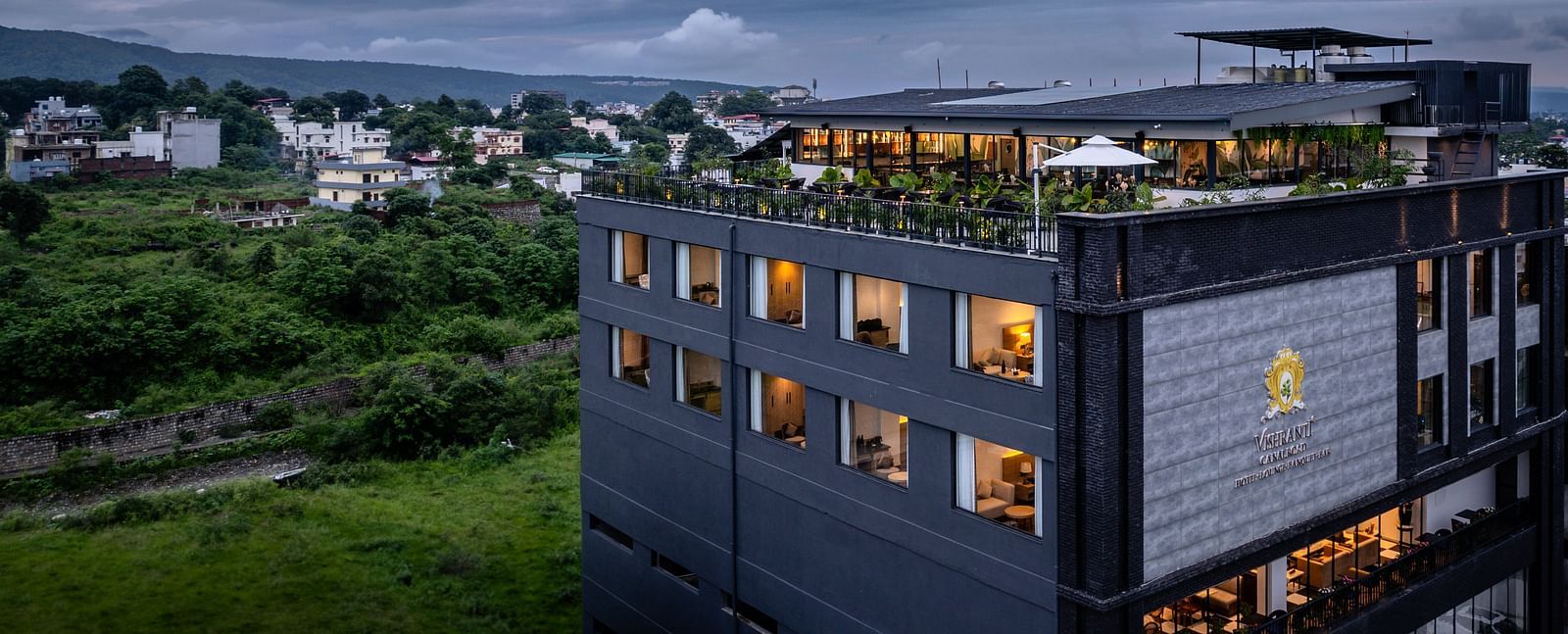 Overview shot of Vishranti Resort, Dehradun  with a backdrop of cloudy sky