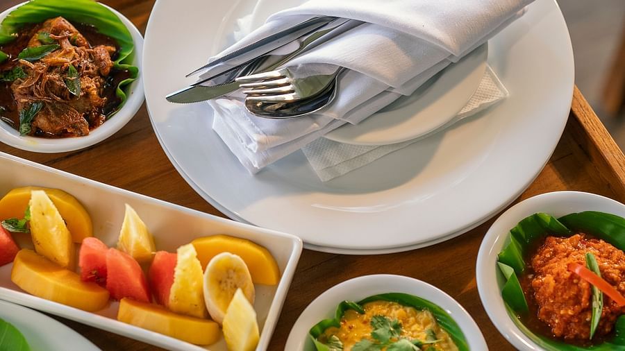 A traditional meal spread on a wooden dining table