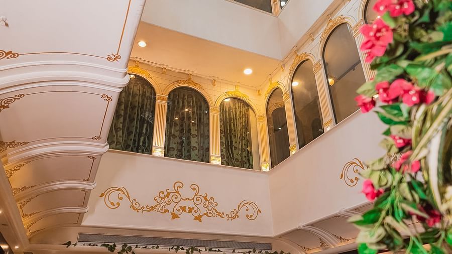 Hotel Ashok Nagpur featuring a multi-level lobby with architectural details and decorative elements.