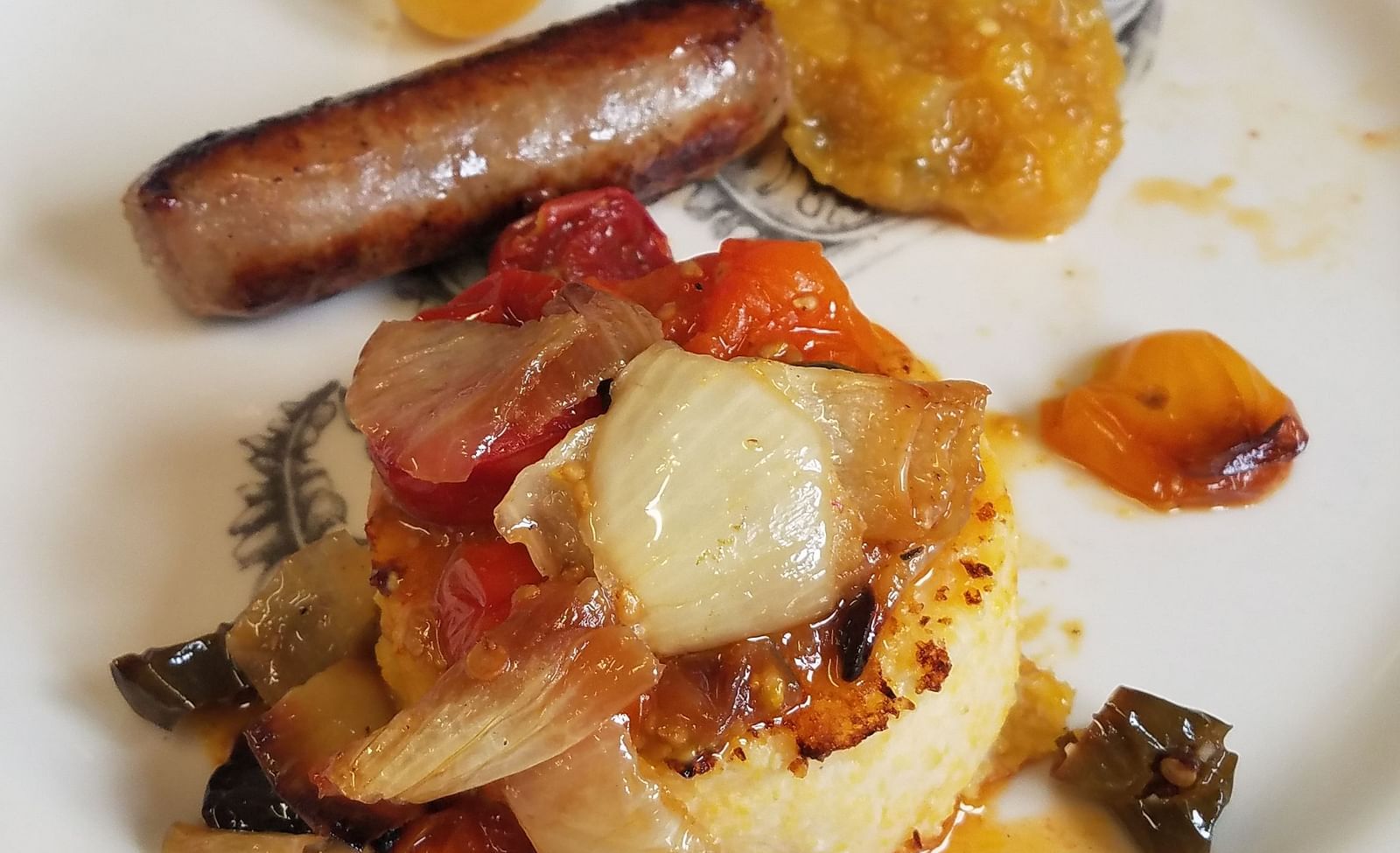 A gourmet dish featuring a perfectly cooked entree with sides - Brewery Gulch Inn & Spa