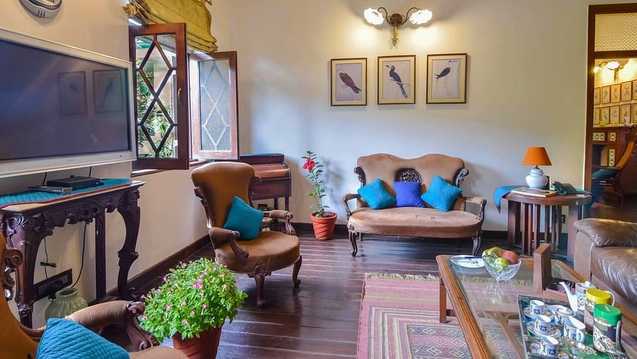 Image of interior of living area of a Hotel Room at Shaheen Bagh Resort Dehradun