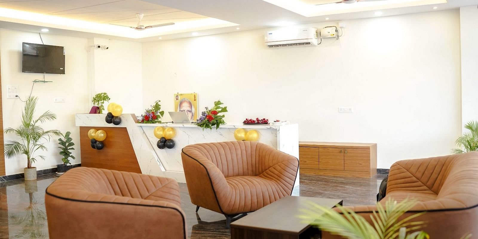 Well-lit lobby area of ANS M Square Hotel & Resort, Kalaburagi