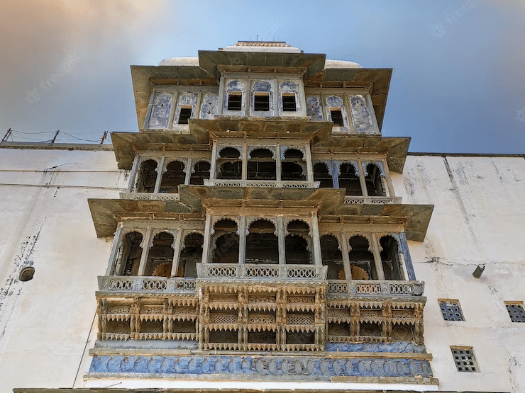 Facade of Sajjangarh Palace, featuring numerous windows