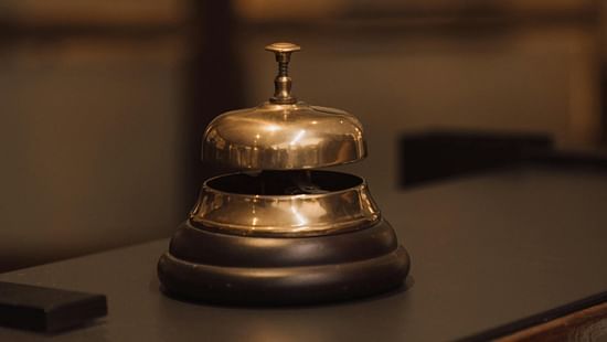an image of concierge bell on the table