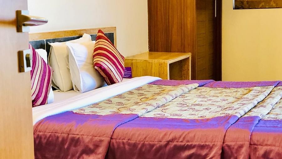 a closer view of the king bed inside the suite - VITS Kamats Resort, Silvassa