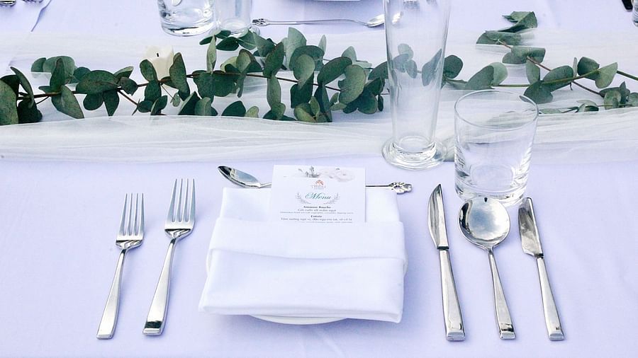 A picture of a table where cutlery is placed - Alibu Resort Nha Trang